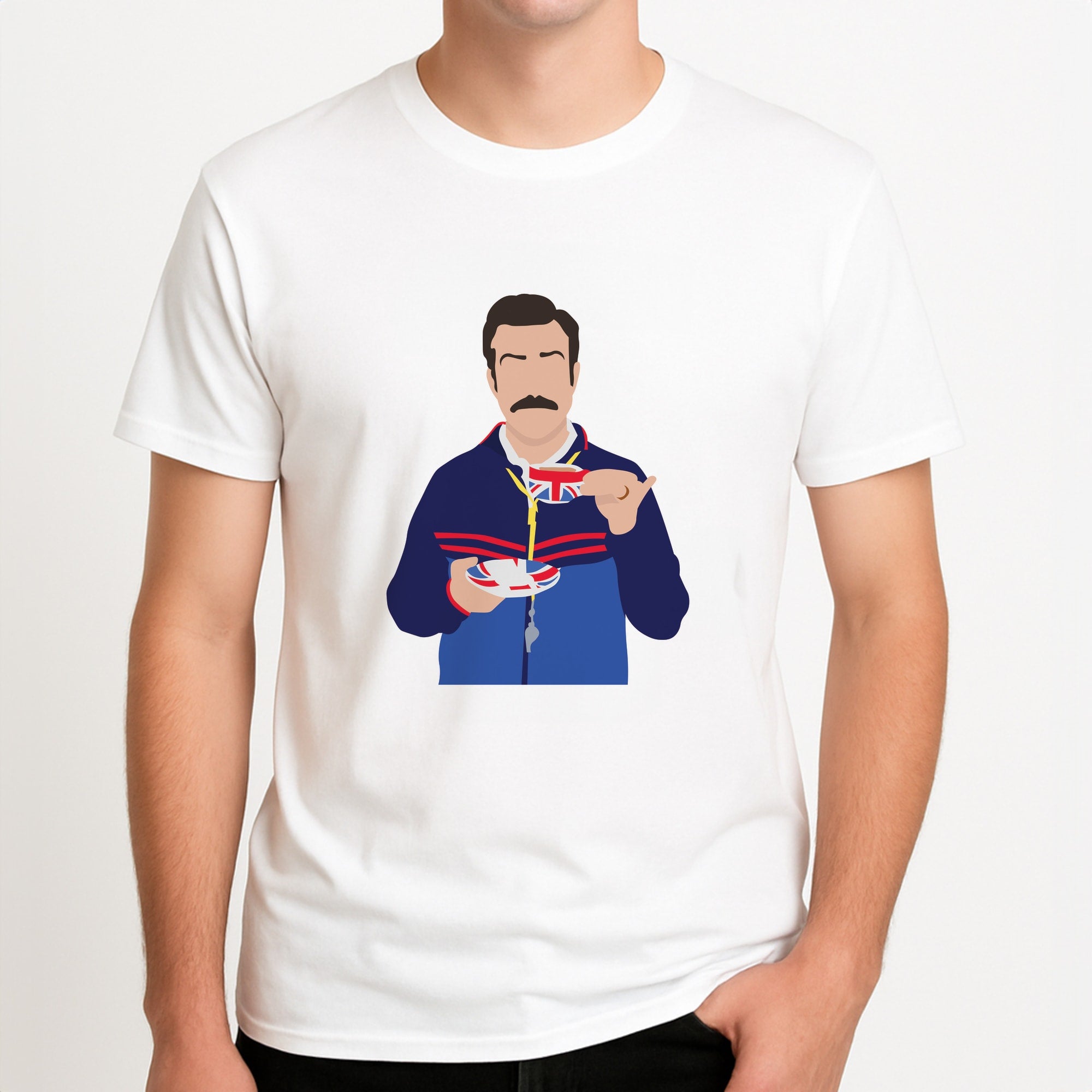 Ted Drinking Tea Unisex T-Shirt, worn by a male model.
