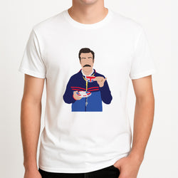 Ted Drinking Tea Unisex T-Shirt, worn by a male model.