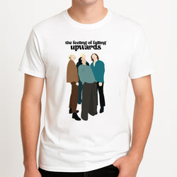The Feeling Of Falling Upwards Unisex T-Shirt, worn by a male model.