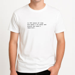 In 900 Years Unisex T-Shirt, worn by a male model.