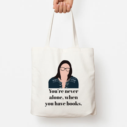 You're Never Alone, When You Have Books Tote Bag