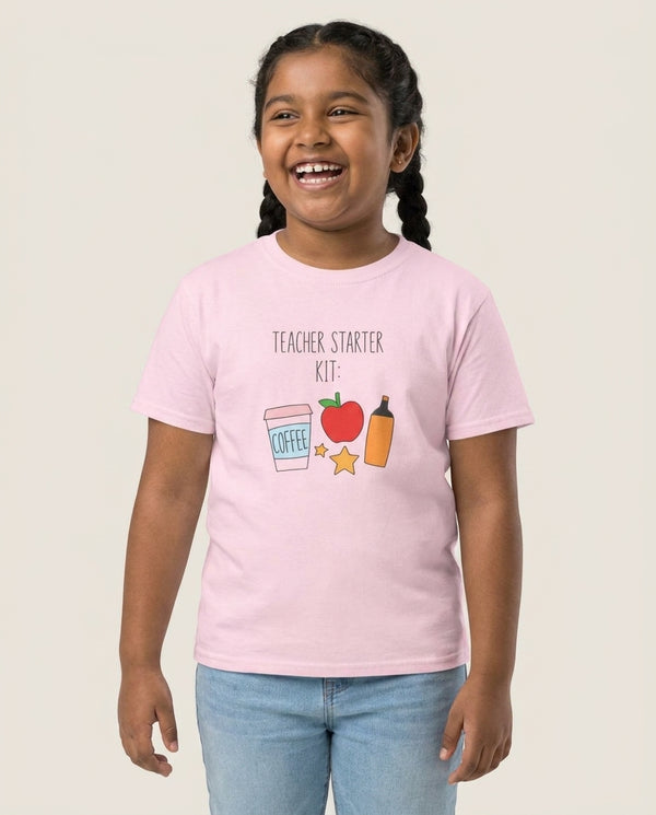 Teacher Starter Kit Kids T-Shirt — Pink Front, worn