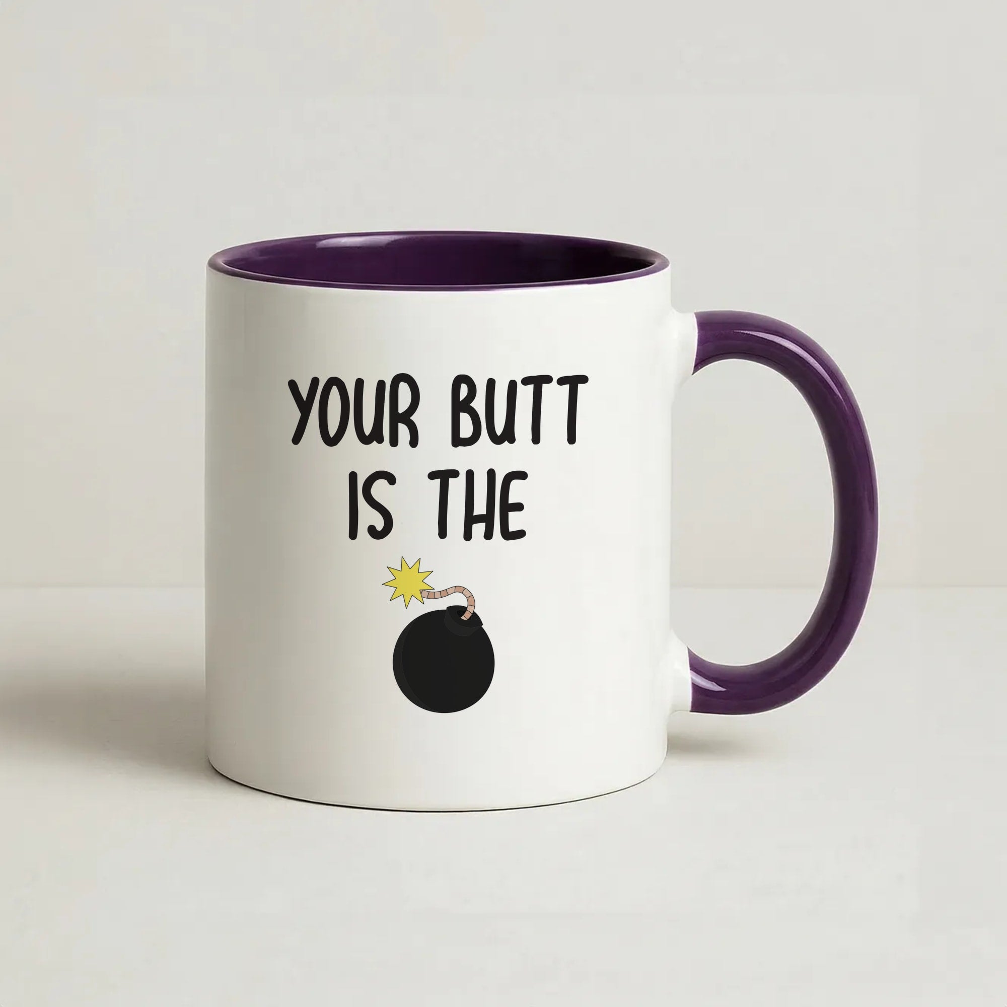 Your Butt Is The Bomb - B99 Coffee Purple Mug