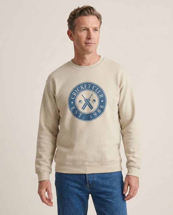 Cricket Badge Sweatshirt — Sand Front, worn