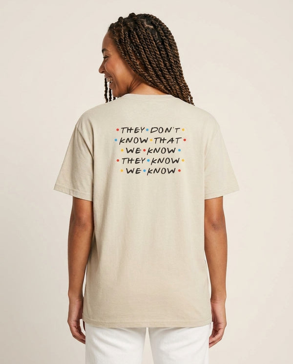 They Dont Know That We Know T-Shirt — Sand Back, worn